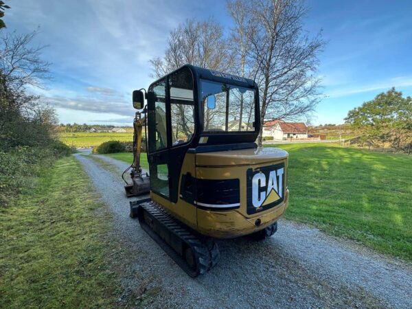 2006-Caterpillar 302.5C + 3 GODETS – Image 30